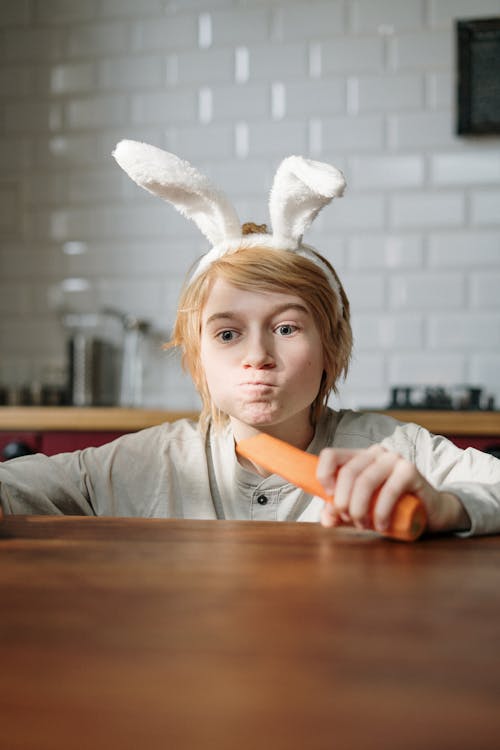 Boy Eating Carrot