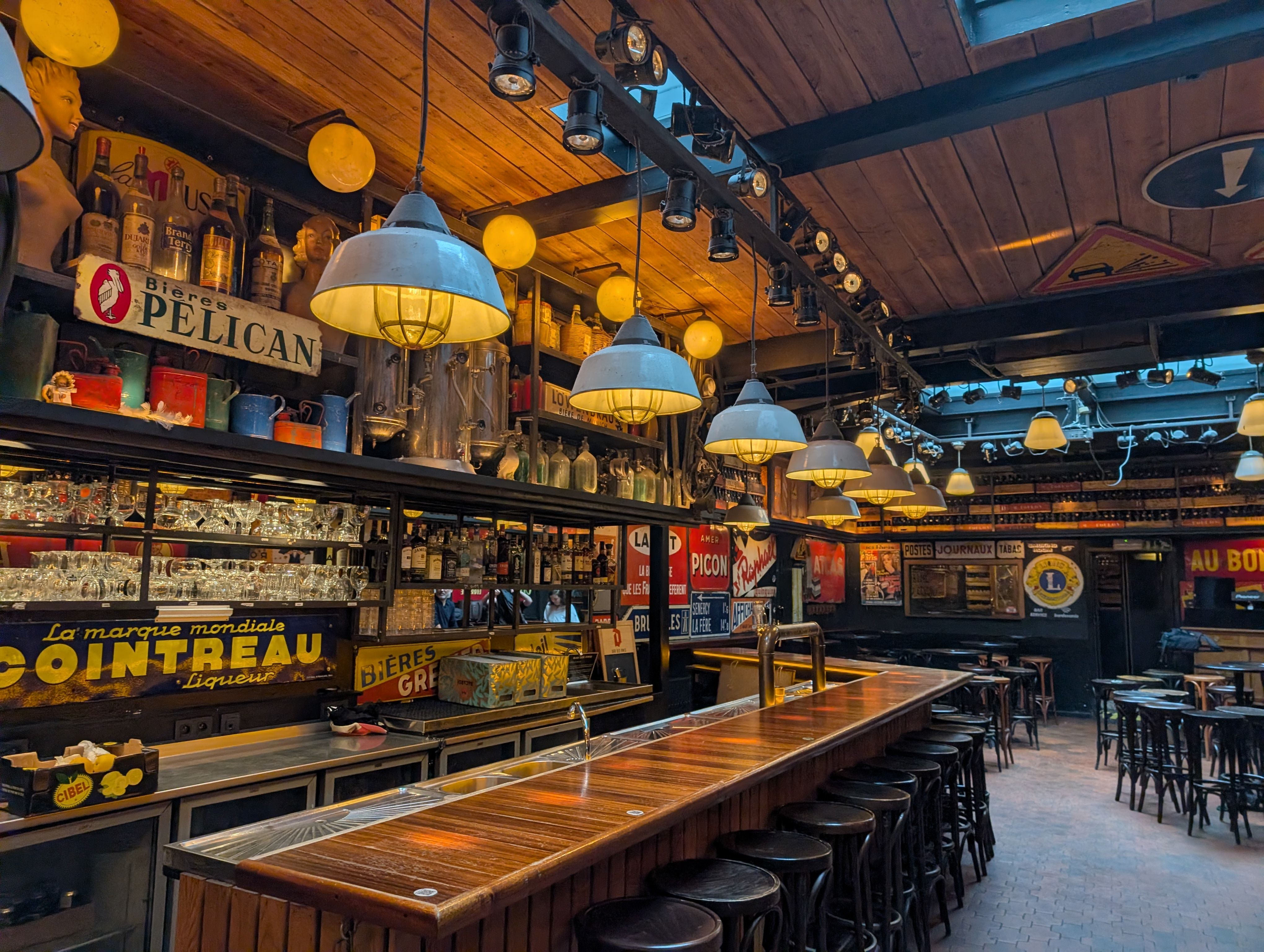 Candid interior of a Brussels bar showcasing vintage decor and inviting ambiance.