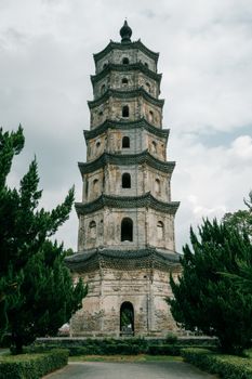 Historic Xun Peak Tower in Huangshan, Anhui Province, China, showcasing ancient Chinese architecture.
