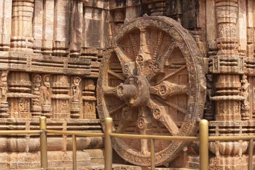 Free Close-up of the detailed stone carvings on the wheel of Konark Sun Temple, Odisha, India. Stock Photo