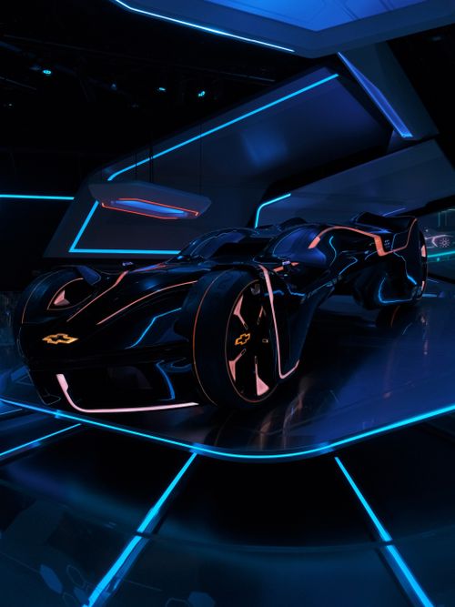 Free Sleek black concept car illuminated by blue and pink neon lights in a modern showroom. Stock Photo
