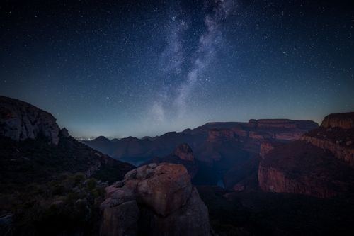 Free Stunning night view of the Milky Way over Blyde River Canyon, South Africa's natural wonder. Stock Photo