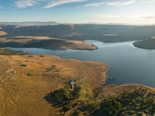 Free A breathtaking aerial view of a lake and mountains in Free State, South Africa. Stock Photo