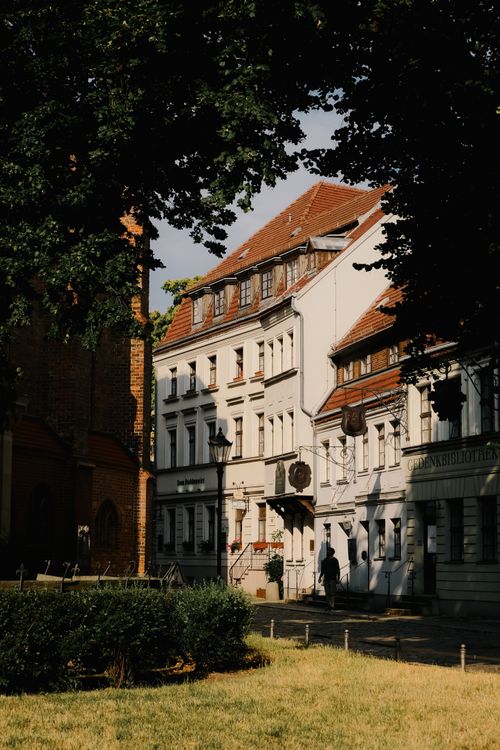 Free A picturesque view of historic European architecture on a sunny day. Stock Photo