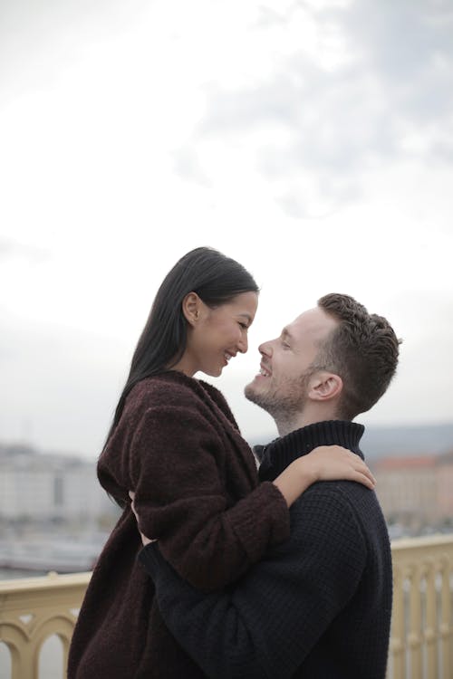 Man and Woman About to Kiss