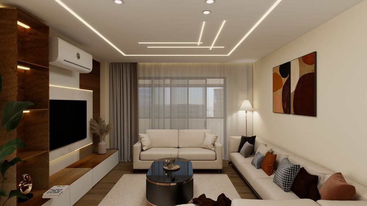 Rented living room with a TV on a low console against a plain wall and a neat cable cover