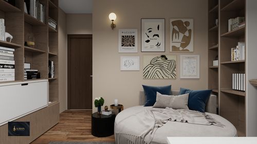 Free Stylish interior featuring cozy seating, modern gallery wall, and elegant bookshelves. Stock Photo