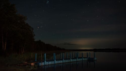 Free Scenic view of a starry night sky over a peaceful lake in Braslaw, Belarus. Stock Photo