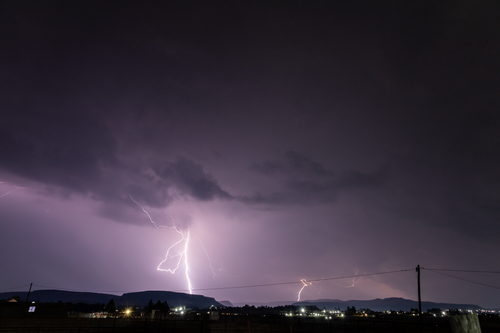 Free A powerful lightning bolt illuminates the night sky over Ephangweni, KwaZulu-Natal. Stock Photo