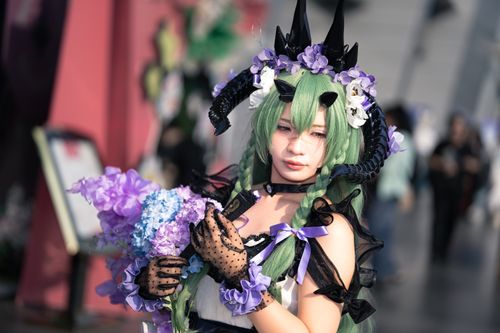 Free Vibrant cosplay with floral accents and fantasy costume at outdoor event. Stock Photo