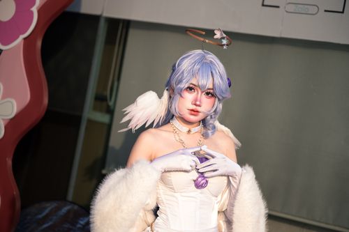 Free A cosplayer posing with angelic accessories in a fantasy-themed costume, showcasing creativity and character design. Stock Photo