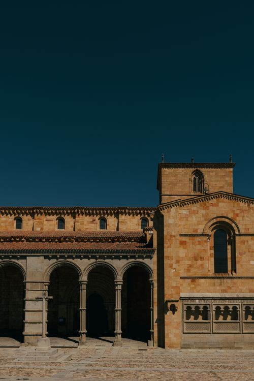 Free Stone facade of Santa María la Real in Ávila, highlighting Romanesque architecture. Stock Photo