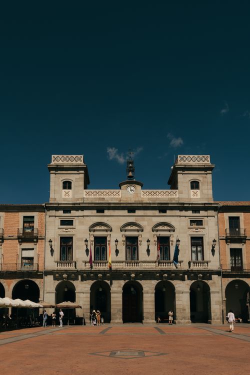 Free Classic view of Ávila's historic town hall in Castilla y León under a clear sky. Stock Photo