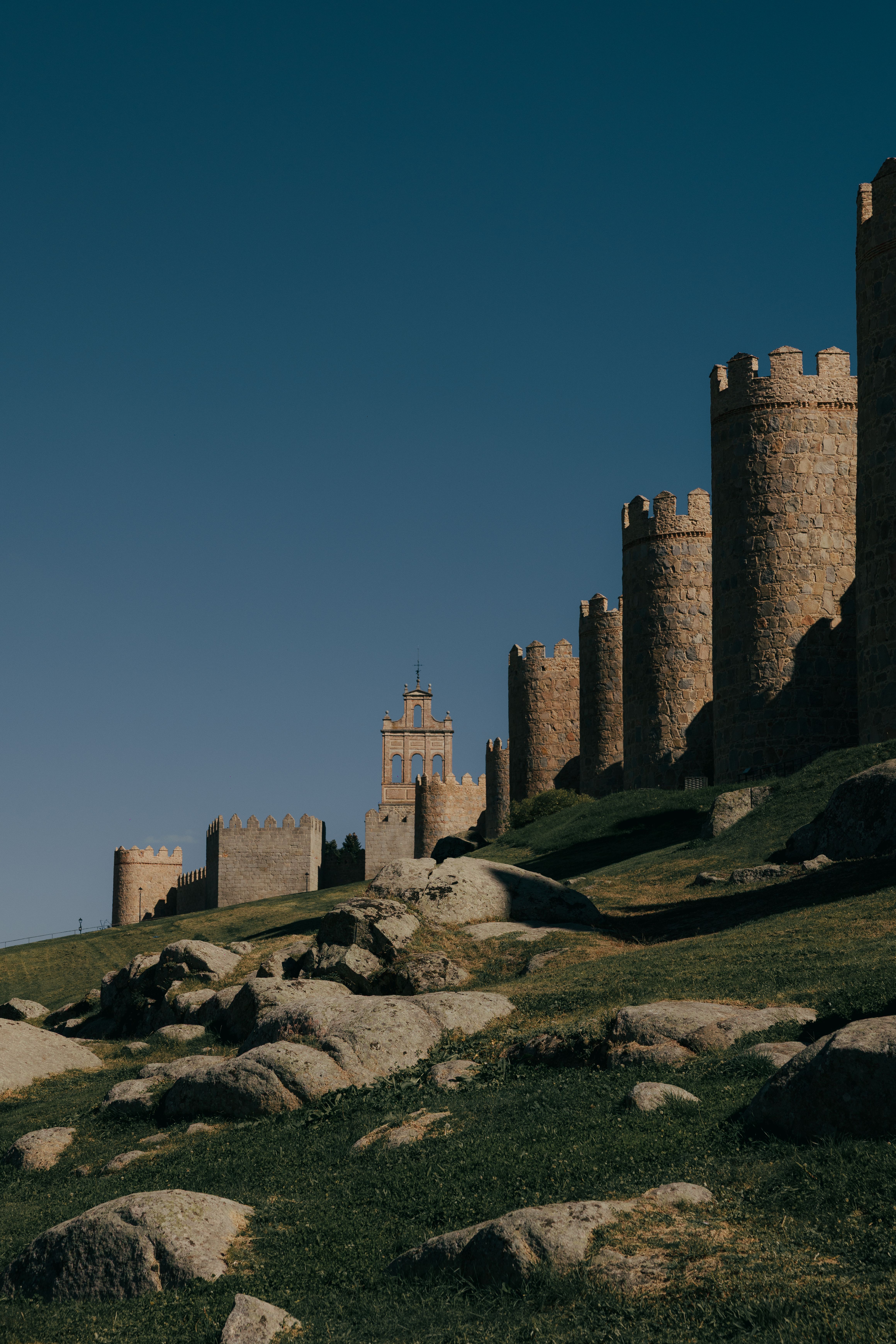 Stunning view of the Ávila city walls, a medieval landmark in Castilla y León, Spain.