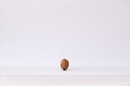 Nut On White Surface