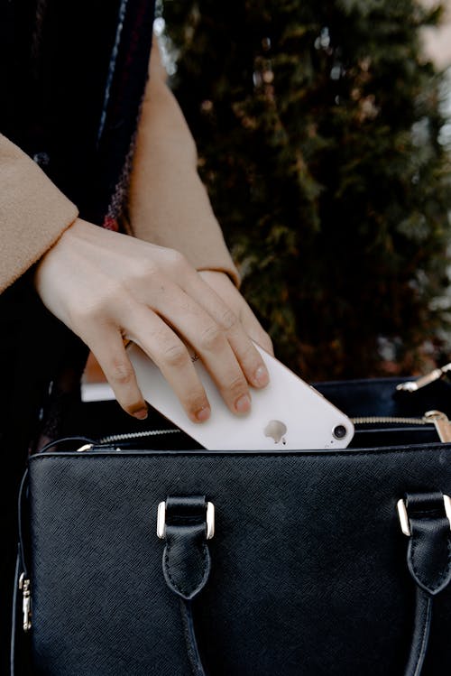 Free Person Holding Black Leather Handbag Stock Photo