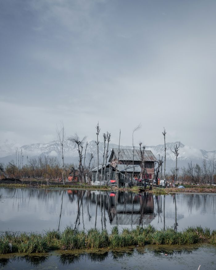 Kashmir lake snow mountains honeymoon