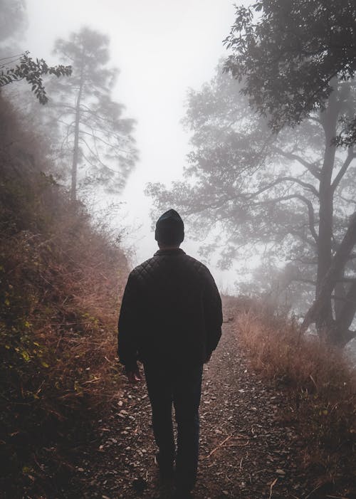 Man in Black Jacket Walking