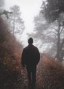 Man in Black Jacket Walking