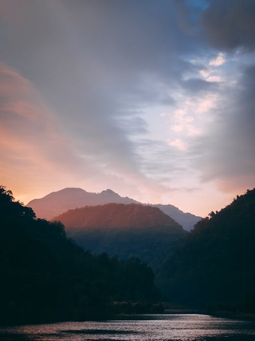 Silhouette Of Mountains During Sunset