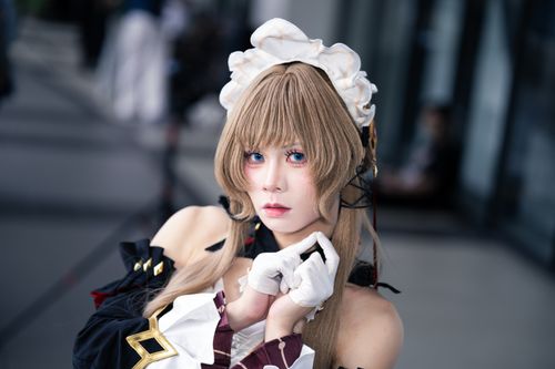 Free A stunning portrait of a cosplayer wearing an intricate anime costume with detailed accessories. Stock Photo