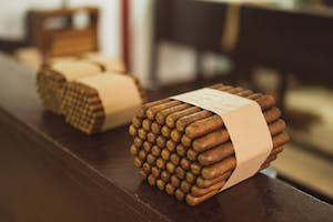 Stacks of raw packed cigars in fabric