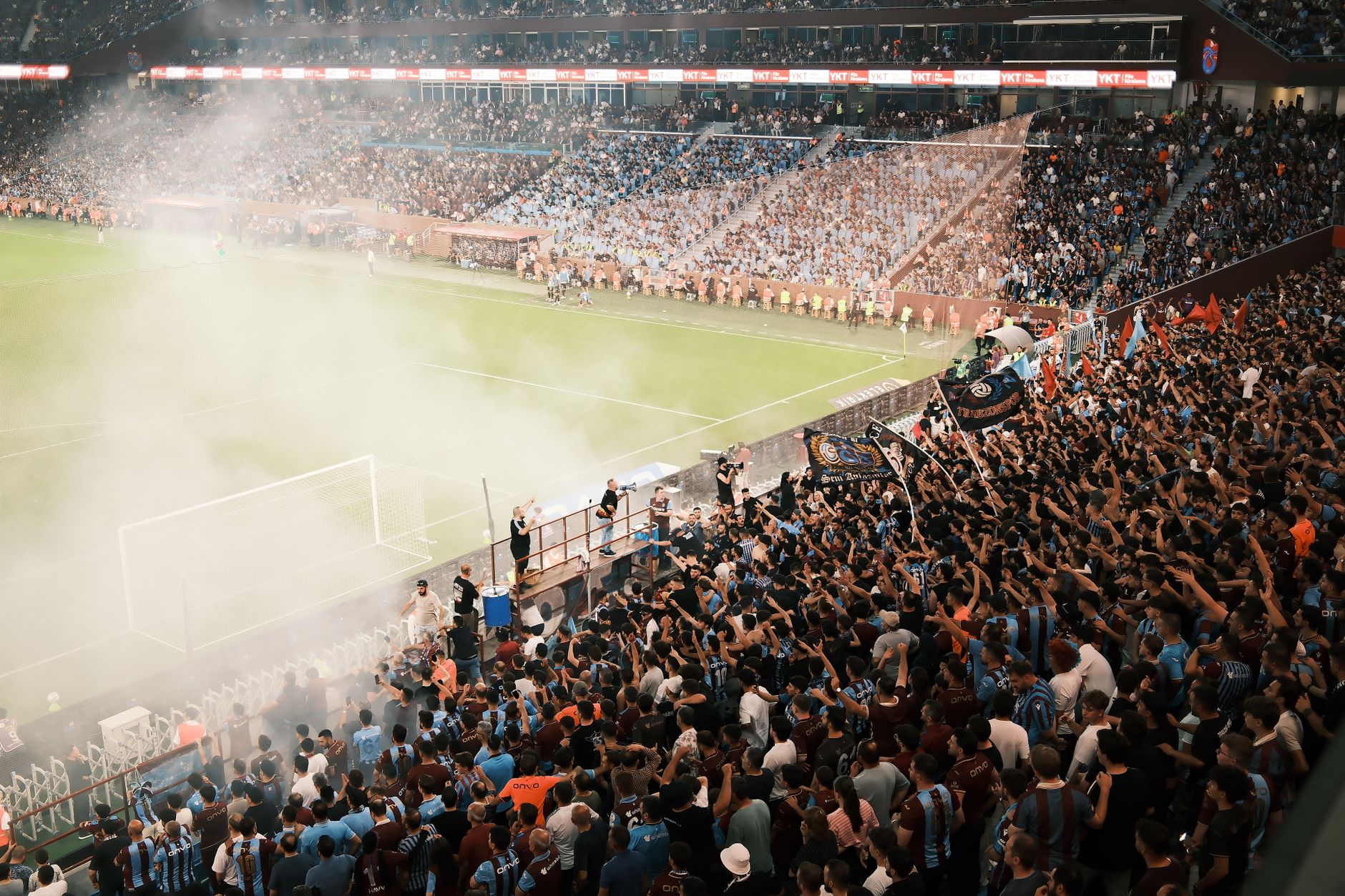 A packed football stadium in North America prepared for a 2026 World Cup match under bright evening lights