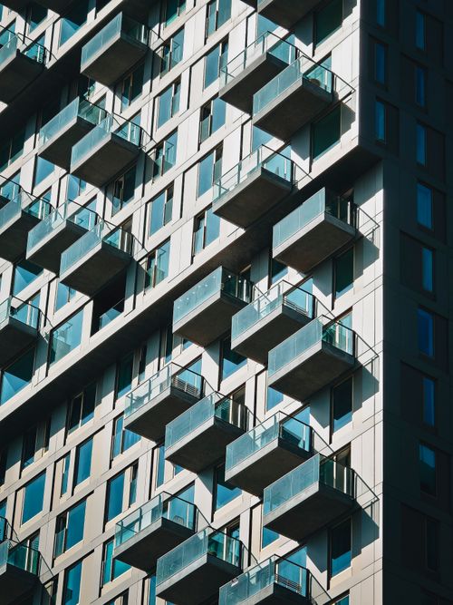 Free Striking modern building facade with protruding balconies and geometric design in Rotterdam. Stock Photo