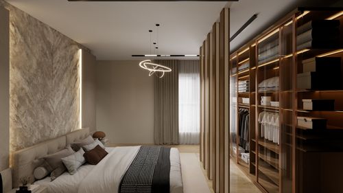 Free Sleek bedroom with elegant lighting and an adjacent walk-in closet. Stock Photo