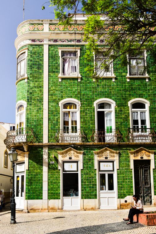 Free A vibrant green tiled building in Faro, showcasing unique Portuguese architecture. Stock Photo