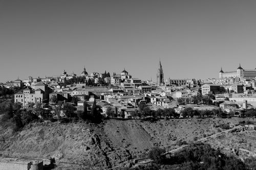 Free Captivating black and white panorama of Toledo's historic skyline highlighting its architectural heritage. Stock Photo