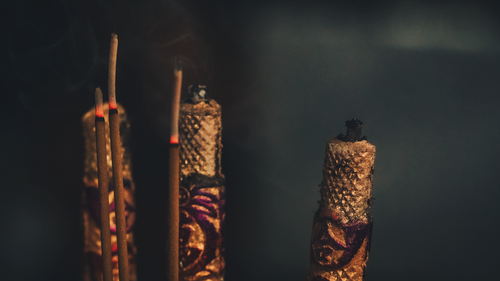 Free Close-up of incense sticks burning gracefully with smoke trails. Stock Photo