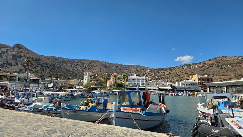 Elounda village, Elounda: Harbour square, tavernas, small beach