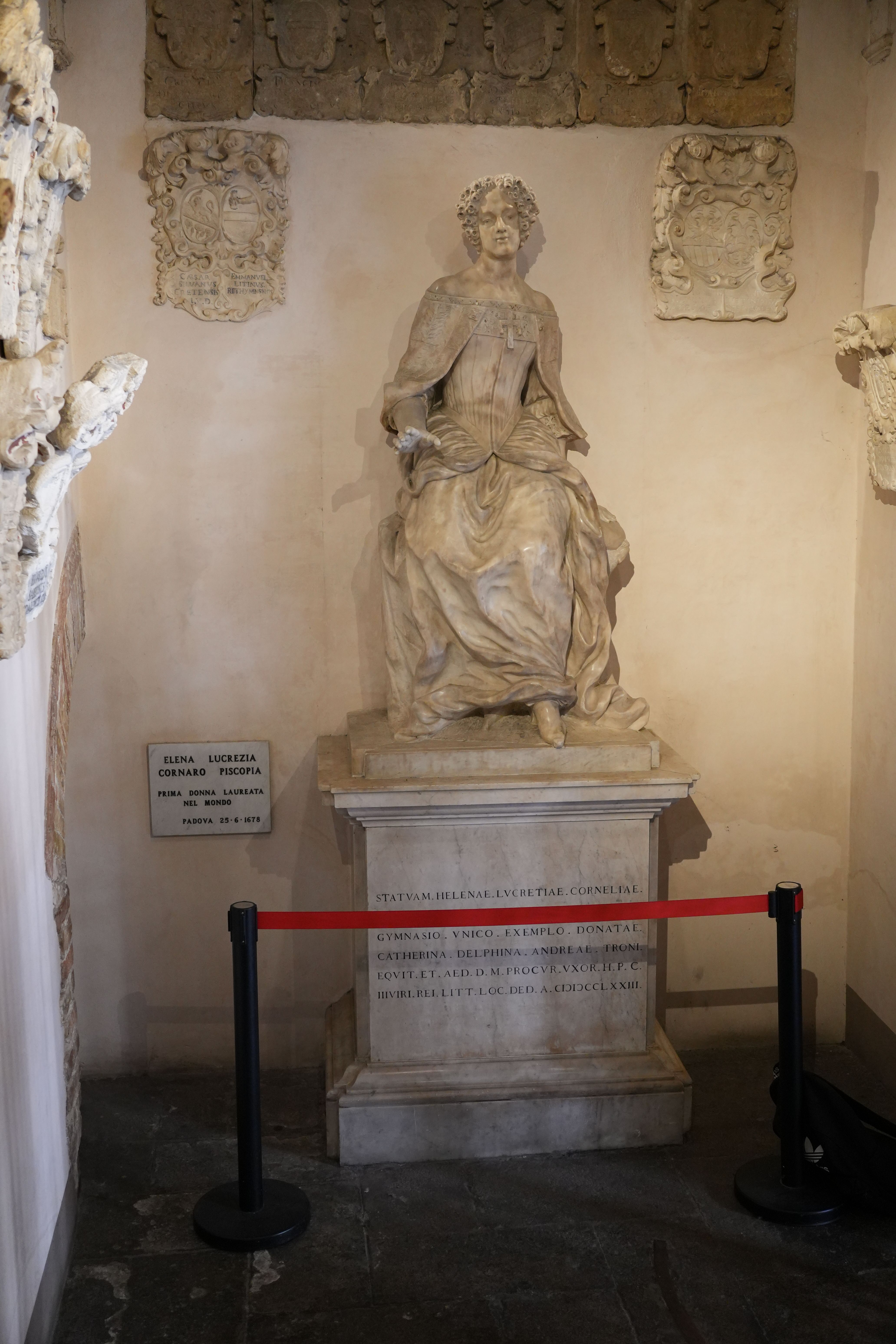 Detailed marble statue located in the historic University of Padua, Italy, showcasing classical art.