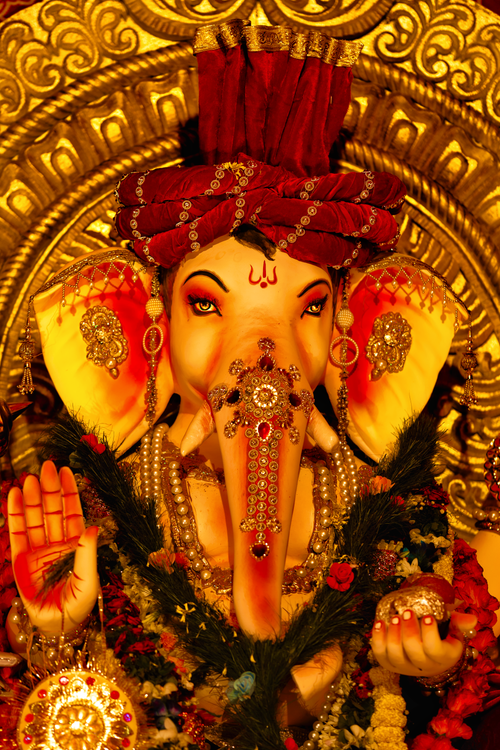 Free Bright and ornate Ganesh idol adorned for Ganesh Chaturthi in Kolkata, India. Stock Photo