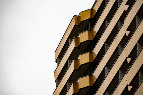 Free Angled view of a modern building facade with unique architecture in Grozny, Russia. Stock Photo