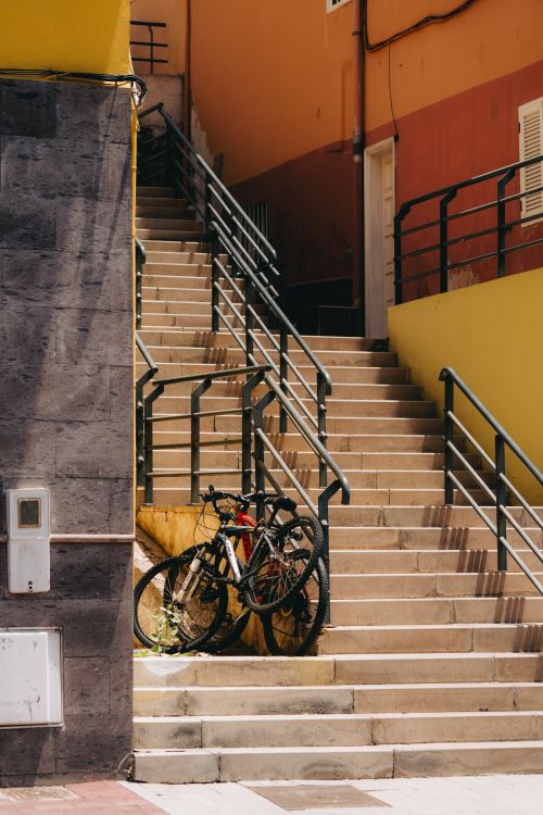 Free Colorful urban staircase with bicycles in San Sebastián de La Gomera, Canary Islands. Stock Photo