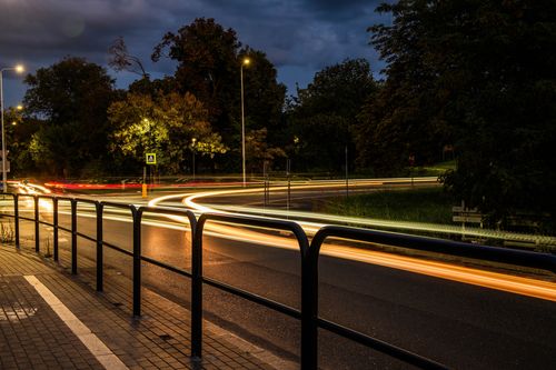 Free Captivating long exposure of night traffic in Toruń, capturing dynamic light trails. Stock Photo