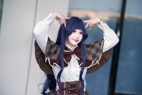 Free A detailed portrait of a cosplayer in costume posing indoors at a convention. Stock Photo