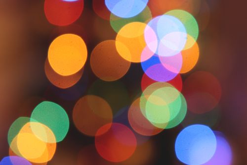 Free Vibrant abstract image with colorful bokeh light circles creating a festive mood. Stock Photo