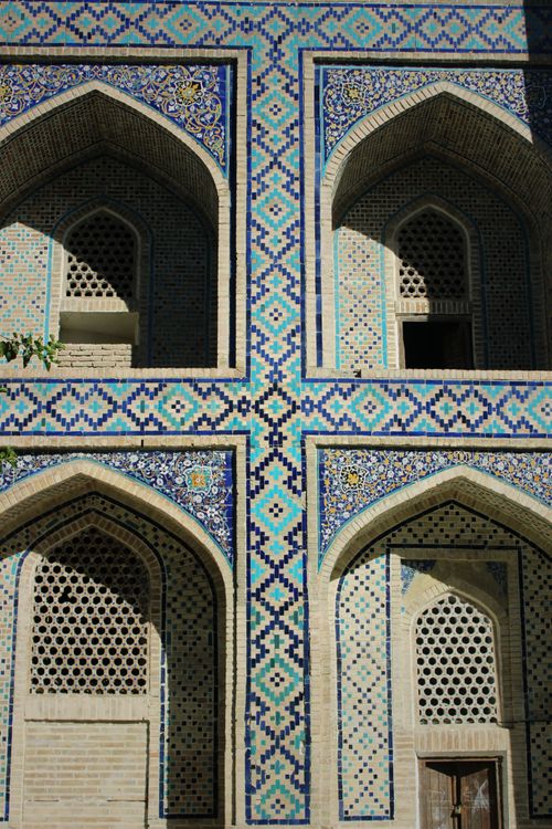 Free Stunning architectural detail of colorful tiled facade in Samarkand, Uzbekistan. Stock Photo