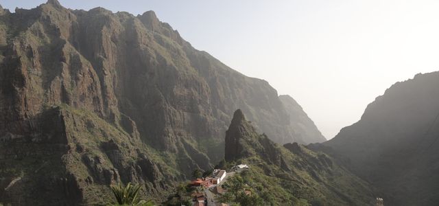Discover the breathtaking views of Tenerife's Masca Valley with towering rocky cliffs.