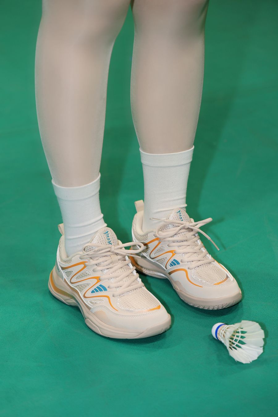 Badminton court shoes on a court surface
