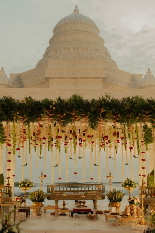 Free Beautifully decorated Indian wedding mandap with floral arrangements and traditional elements. Stock Photo