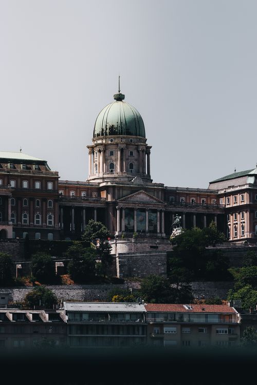 Free A striking view of Buda Castle in Budapest, showcasing its majestic architecture against a clear sky. Stock Photo