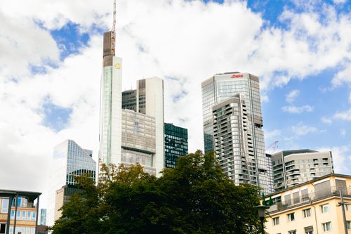 Free Skyline of Frankfurt featuring the Commerzbank Tower on a clear day. Stock Photo