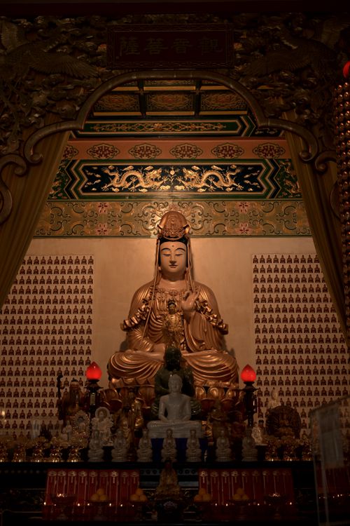 Free Golden Buddha statue inside Thean Hou Temple, Kuala Lumpur, featuring intricate carvings. Stock Photo
