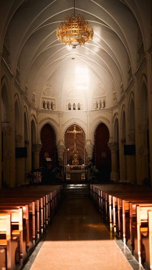 Free Beautiful sunlit interior of a church in My Tho, Vietnam, featuring ornate architecture and tranquil ambiance. Stock Photo