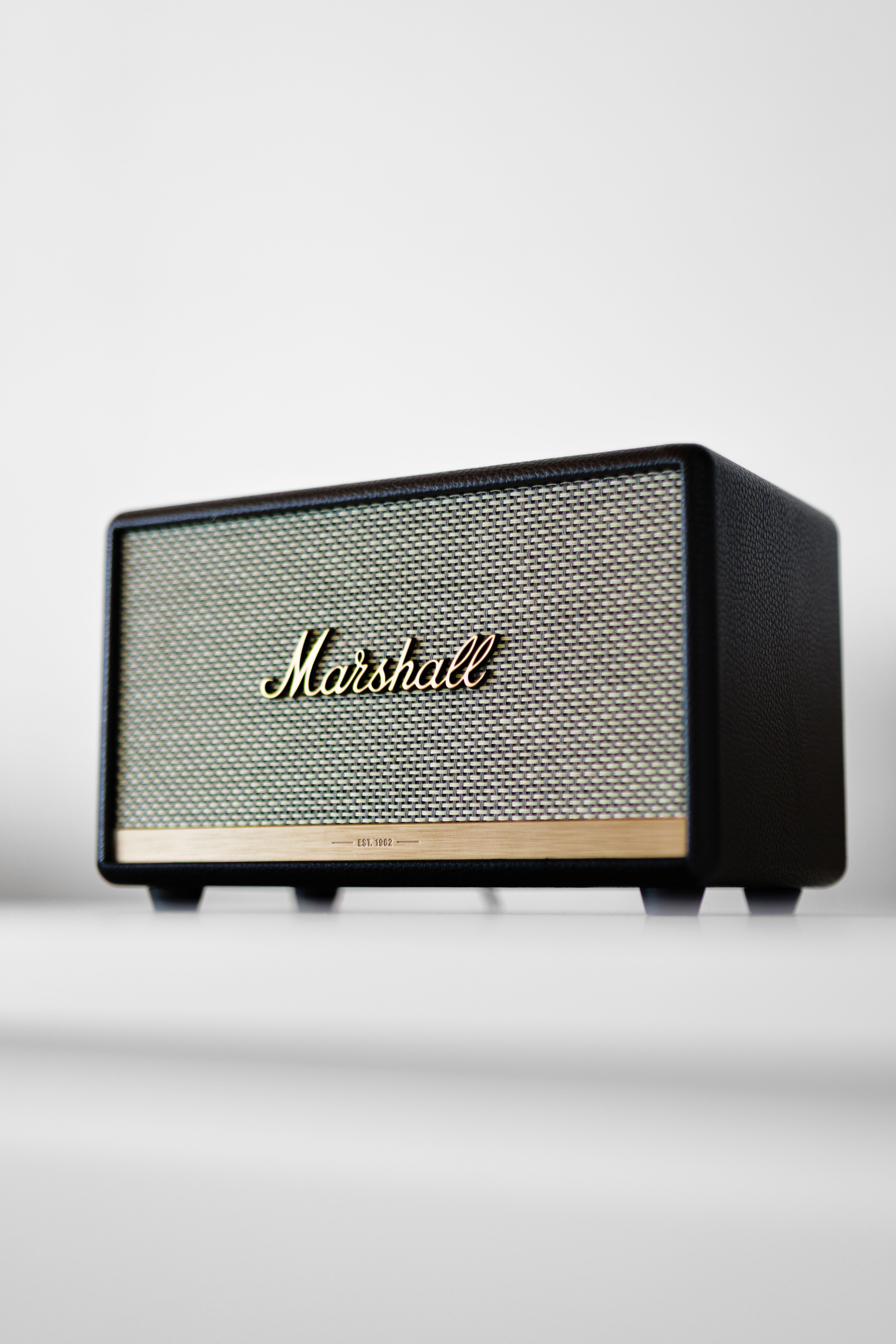 Elegant Marshall Bluetooth speaker with classic design on a clean white background.