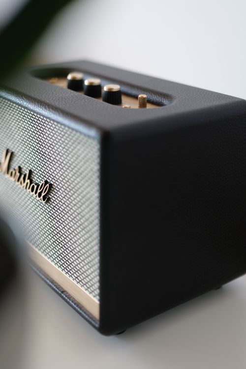 Free Elegant close-up of a black Marshall amplifier with control knobs, perfect for music enthusiasts. Stock Photo
